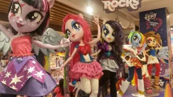 Size: 960x540 | Tagged: safe, derpibooru import, applejack, pinkie pie, rainbow dash, rarity, twilight sparkle, twilight sparkle (alicorn), alicorn, equestria girls, rainbow rocks, box art, convention, devil horn (gesture), doll, irl, life size, mannequin, merchandise, my little pony logo, nightmare fuel, photo, ponied up, store display, toy