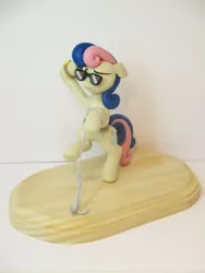 Size: 3456x4608 | Tagged: artist:earthenpony, bon bon, bon bond, craft, derpibooru import, grappling hook, irl, photo, safe, sculpture, secret agent sweetie drops, slice of life (episode), solo, sunglasses, sweetie drops, that was fast, watch