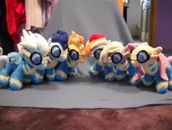 Size: 1024x768 | Tagged: safe, artist:xsjado78, derpibooru import, derpy hooves, fleetfoot, fluttershy, rainbow dash, soarin', spitfire, pegasus, pony, female, irl, mare, photo, plushie, wonderbolts