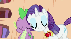 Size: 850x475 | Tagged: safe, derpibooru import, screencap, rarity, spike, dragon, pony, unicorn, secret of my excess, animated, eyes closed, female, fire ruby, gif, golden oaks library, hub logo, imma snuggle you, male, mare, nuzzling, snuggling, spikelove
