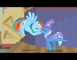 Size: 1024x800 | Tagged: safe, artist:niggerfaggot, derpibooru import, rainbow dash, trixie, pegasus, pony, unicorn, boast busters, blushing, cape, clothes, cute, dashabetes, diatrixes, female, hat, kissing, lesbian, love, mare, musical instrument, rarepair, shipping, trixdash, trixie's cape, trixie's hat, trumpet