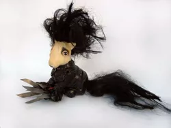 Size: 660x495 | Tagged: safe, derpibooru import, earth pony, pony, custom, edward scissorhands, irl, male, photo, sitting, solo, stallion, tim burton, toy