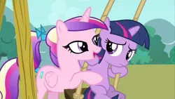 Size: 1280x720 | Tagged: safe, derpibooru import, screencap, princess cadance, twilight sparkle, alicorn, pony, unicorn, a canterlot wedding, duo, duo female, female, filly, out of context, princess, swing, teen princess cadance, teenager, younger