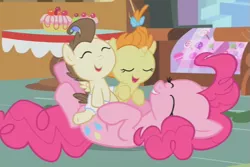 Size: 525x350 | Tagged: safe, derpibooru import, screencap, pinkie pie, pound cake, pumpkin cake, earth pony, pegasus, pony, unicorn, baby cakes, baby, baby pony, cake twins, cropped, diaper, diapered, diapered colt, diapered filly, diapered foals, eyes closed, female, mare, on back, one month old colt, one month old filly, one month old foals, playful, sugarcube corner, white diapers