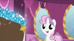 Size: 849x471 | Tagged: safe, derpibooru import, screencap, sweetie belle, pony, unicorn, sisterhooves social, carousel boutique, female, filly, gem, solo, youtube caption