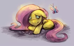 Size: 800x498 | Tagged: dead source, safe, artist:asieybarbie, derpibooru import, fluttershy, butterfly, pegasus, pony, female, floppy ears, mare, photoshop, prone, smiling, solo