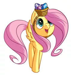 Size: 547x577 | Tagged: safe, artist:reuniclus, derpibooru import, fluttershy, pegasus, pony, basket, basket hat, cute, easter, egg, female, hat, mare, shyabetes, simple background, solo, spread wings, white background, wings