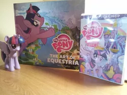 Size: 800x600 | Tagged: safe, banned from derpibooru, deleted from derpibooru, derpibooru import, twilight sparkle, alicorn, the art of equestria, book, dvd, funko, irl, merchandise, photo, toy, twilight sparkle (alicorn)