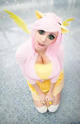 Size: 582x900 | Tagged: suggestive, banned from derpibooru, deleted from derpibooru, derpibooru import, edit, human, big breasts, big eyes, breasts, clothes, cosplay, costume, funny, irl, irl human, jessica nigri, photo