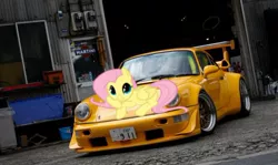 Size: 550x327 | Tagged: safe, artist:bboymidnight, banned from derpibooru, deleted from derpibooru, derpibooru import, fluttershy, car, porsche, porsche 911, solo