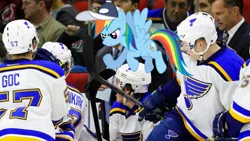 Size: 955x537 | Tagged: safe, banned from derpibooru, deleted from derpibooru, derpibooru import, rainbow dash, human, pony, coach, hockey, ice hockey, irl, irl human, nhl, obligatory pony, photo, ponies in real life, solo, sports, st. louis blues