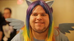 Size: 970x545 | Tagged: safe, banned from derpibooru, deleted from derpibooru, derpibooru import, rainbow dash, human, a brony tale, brony, brony stereotype, clothes, cosplay, costume, irl, irl human, neckbeard, photo