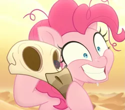 Size: 771x675 | Tagged: safe, banned from derpibooru, deleted from derpibooru, derpibooru import, pinkie pie, gryphon, my little pony: the movie, crazy face, desert, faic, skull, solo