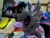 Size: 2048x1536 | Tagged: safe, artist:joltage, artist:nazegoreng, photographer:corpulentbrony, twilight sparkle, twilight sparkle (alicorn), alicorn, pony, bed, female, irl, irl photo, looking to the left, mare, on bed, open mouth, photo, plushie, sideways glance, spread wings, wings