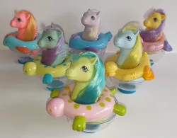 Size: 960x750 | Tagged: safe, derpibooru import, photographer:candiedchris, backstroke, sea rider, sea shimmer, sea star, splasher, surf rider, tiny bubbles, bird, duck, fish, pony, sea pony, turtle, adorastroke, baby sea ponies, cup, cute, cutie shimmer, female, filly, g1, image, inner tube, irl, irl photo, jpeg, photo, sea ponies, sea stawwr, splasherbetes, surfabetes, tinydorable, toy