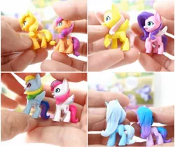 Size: 1496x1256 | Tagged: safe, derpibooru import, applejack, fluttershy, izzy moonbow, pipp petals, rainbow dash, sunny starscout, trixie, zipp storm, earth pony, pegasus, pony, unicorn, my little pony: a new generation, figurine, g4, g5, image, jpeg, toy