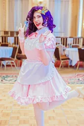 Size: 1362x2048 | Tagged: safe, artist:lochlan o'neil, derpibooru import, pipp petals, human, my little pony: a new generation, clothes, cosplay, costume, g5, image, irl, irl human, jpeg, maid, one leg raised, open mouth, open smile, peace sign, photo, ponyville ciderfest, smiling