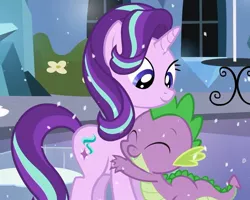 Size: 901x719 | Tagged: safe, derpibooru import, edit, edited screencap, screencap, spike, starlight glimmer, dragon, pony, season 6, the crystalling, cute, duo, female, happy glimmy, hug, image, jpeg, male, shipping, smiling, snow, sparlight, straight, when she smiles