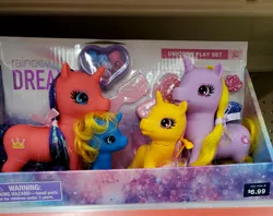 Size: 2985x2367 | Tagged: safe, derpibooru import, pony, unicorn, adult, baby, bootleg, bow, brush, curly hair, cutie mark, female, filly, image, irl, jpeg, mane bow, photo, rainbow dreams, store, tinsel, toy, united states, walgreens