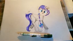 Size: 4032x2268 | Tagged: safe, artist:engi, derpibooru import, oc, oc:azure serenity, pegasus, pony, bow, clothes, colored pencil drawing, cute, female, full body, happy, image, jpeg, looking at you, mare, open mouth, pegasus oc, pencil, pencil drawing, photo, simple background, smiling, solo, traditional art, wings