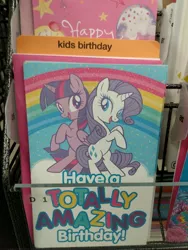 Size: 3120x4160 | Tagged: safe, derpibooru import, rarity, twilight sparkle, twilight sparkle (alicorn), alicorn, pony, unicorn, back to back, bipedal, birthday, birthday card, duo, duo female, female, five below, image, jpeg, merchandise, open mouth, photo