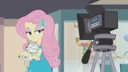 Size: 3410x1920 | Tagged: safe, derpibooru import, screencap, fluttershy, dog, equestria girls, equestria girls series, outtakes (episode), clothes, cutie mark, cutie mark on clothes, female, geode of fauna, hairpin, high res, image, jewelry, jpeg, magical geodes, necklace, smiling, smug, smugshy, video camera