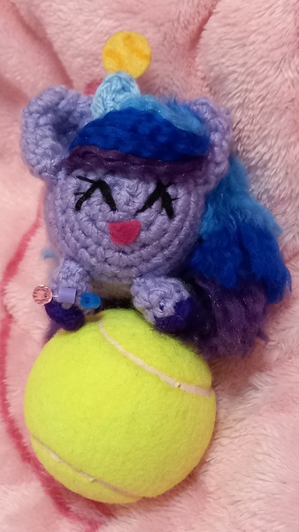 Size: 2250x4000 | Tagged: safe, artist:casquitos kawaii, derpibooru import, izzy moonbow, unicorn, amigurumi, ball, crochet, cute, g5, handmade, image, irl, izzy's tennis ball, izzybetes, jpeg, photo, plushie, solo, tennis ball