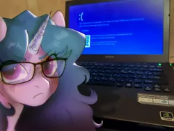 Size: 3000x2250 | Tagged: safe, artist:kotletova97, derpibooru import, izzy moonbow, pony, unicorn, angry, blue screen of death, computer, female, frown, g5, glasses, image, irl, jpeg, laptop computer, mare, photo, ponies in real life, solo