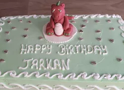 Size: 1193x872 | Tagged: safe, derpibooru import, spike (g1), dragon, :p, birthday cake, cake, fondant, food, g1, happy birthday, heart, male, photo, solo, text, tongue out