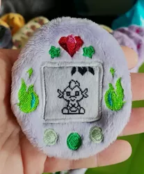 Size: 1561x1889 | Tagged: safe, artist:sew_adorkable, artist:trashkitten-plushies, derpibooru import, spike, buttons, embroidery, irl, photo, plushie, solo, tamagotchi