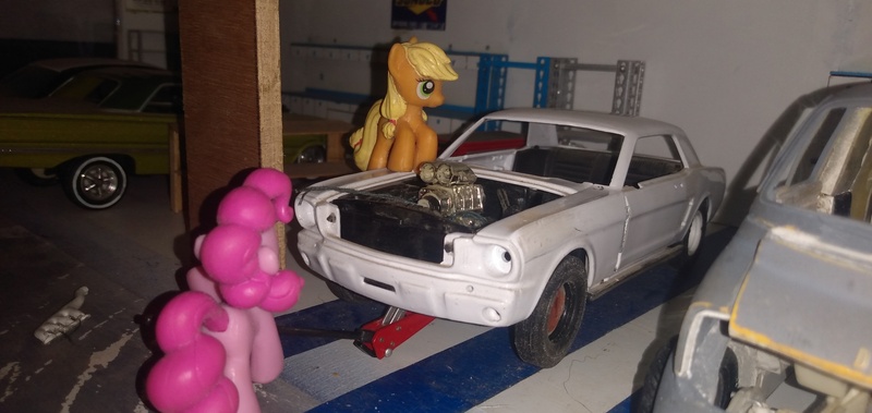 Size: 3264x1546 | Tagged: safe, derpibooru import, applejack, pinkie pie, blind bag, car jack, chevrolet impala, dodge van, everfree customs, female, ford mustang, garage, irl, photo, shelf, toy, workbench