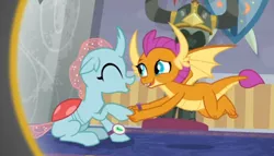 Size: 718x411 | Tagged: safe, derpibooru import, screencap, ocellus, smolder, changedling, changeling, dragon, a matter of principals, cropped, cute, diaocelles, dragoness, duo, eyes closed, female, flying, holding hands, shipping, smiling, smolderbetes, watch