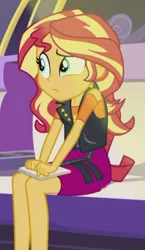 Size: 482x829 | Tagged: safe, derpibooru import, screencap, sunset shimmer, driving miss shimmer, equestria girls, equestria girls series, animation error, clothes, confused, cropped, cutie mark, cutie mark on clothes, driving miss shimmer: rarity, female, geode of empathy, image, jewelry, leather vest, legs, limousine, magical geodes, necklace, notepad, png, raised eyebrow, red hair, shoulderless shirt, skirt, solo, spikes, yellow streaks