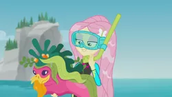 Size: 1920x1080 | Tagged: safe, derpibooru import, screencap, fluttershy, equestria girls, equestria girls series, unsolved selfie mysteries, animation error, armpits, beach, clothes, diving goggles, diving suit, female, ocean, rock horse, scuba mask, snorkel, solo, swimsuit, wet, wet hair, wetsuit