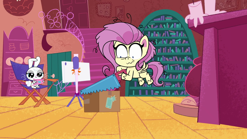 Size: 1920x1080 | Tagged: safe, derpibooru import, screencap, angel bunny, fluttershy, pegasus, pony, my little pony: pony life, unboxing day, spoiler:pony life s01e18, spoiler:pony life s01e30, box, saw, shrunken pupils, wavy mouth