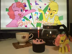 Size: 1280x960 | Tagged: safe, artist:dieva4130, derpibooru import, fluttershy, pinkie pie, earth pony, pony, bib, candle, celebration, chica, coffee, coffee mug, coffee pot, computer monitor, crossover, cupcake, duo, five nights at freddy's, five nights at freddy's 2, food, irl, mug, one eye closed, photo, toy, toy chica, wink