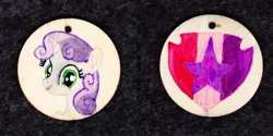 Size: 1024x513 | Tagged: safe, artist:malte279, derpibooru import, sweetie belle, pony, unicorn, craft, cutie mark, female, filly, jewelry, pendant, the cmc's cutie marks, traditional art, wood