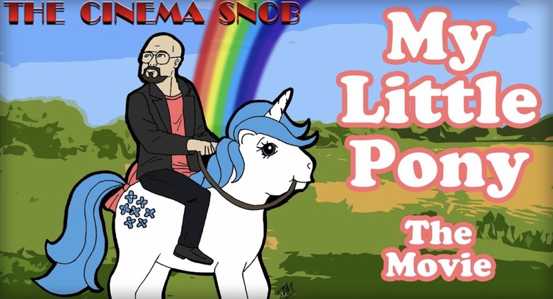 Size: 1605x869 | Tagged: safe, derpibooru import, majesty, pony, unicorn, my little pony: the movie (g1), bow, brad jones, channel awesome, cinema snob, female, g1, male, rainbow, review, tail bow, tgwtg, title card