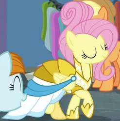 Size: 1082x1093 | Tagged: safe, derpibooru import, screencap, applejack, fluttershy, joan pommelway, pony, fake it 'til you make it, clothes, cropped, dress, eyes closed, female, mare, raised hoof, rarity for you, solo focus, warrior of inner strength, warriorshy