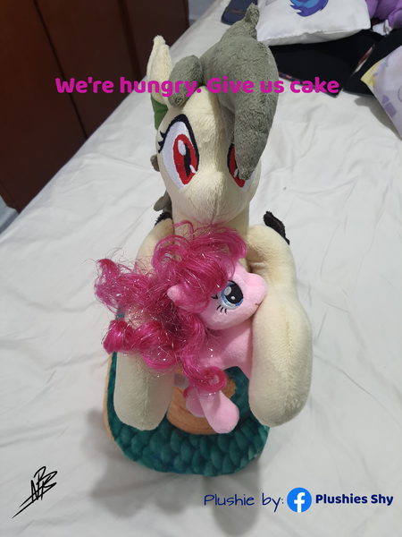 Size: 3024x4032 | Tagged: safe, artist:shappy the lamia, derpibooru import, edit, pinkie pie, oc, oc:shappy, earth pony, hybrid, lamia, original species, plush pony, pony, semi-anthro, bed, bedroom, caption, carrying, chibi, coiling, coils, cute, facebook, female, front view, hug, hungry, image macro, love, mother and child, mother and daughter, perspective, photo, pillow, please, pleased, plushie, plushies shy, realistic, scales, slit eyes, snake eyes, snake tail, solo, tender, text