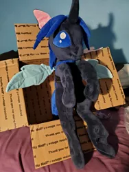 Size: 3024x4032 | Tagged: safe, artist:klplushies, derpibooru import, oc, oc:swift dawn, unofficial characters only, changeling, bed, bed bug, blue changeling, blue eyes, changeling in a box, changeling oc, cute, irl, photo, plushie, sitting, wings