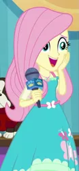 Size: 285x612 | Tagged: safe, derpibooru import, screencap, fluttershy, dog, best in show: the pre-show, equestria girls, equestria girls series, spoiler:eqg series (season 2), best in show logo, cropped, cute, female, microphone, open mouth, shyabetes, smiling, solo