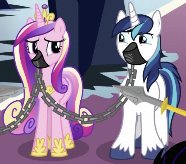 Size: 595x523 | Tagged: safe, derpibooru import, screencap, princess cadance, shining armor, pony, the beginning of the end, chains, cropped, duo, gag, muzzle, muzzle gag