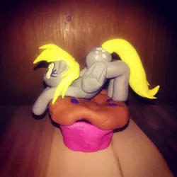 Size: 1080x1080 | Tagged: safe, artist:rxndxm.artist, derpibooru import, derpy hooves, pegasus, pony, craft, eyelashes, female, food, irl, mare, muffin, photo, sculpture, solo, traditional art