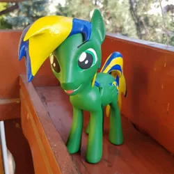 Size: 1024x1024 | Tagged: safe, artist:mraagh, derpibooru import, oc, oc:chacek, unofficial characters only, pegasus, pony, 3d, 3d printed, blender, eyebrows, figurine, green coat, green eyes, irl, male, multicolored hair, multicolored mane, open eyes, photo, sfm pony, shadow, silly, solo, spiky mane, stallion, standing, statue, tongue out
