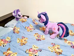 Size: 1024x768 | Tagged: safe, artist:nekokevin, derpibooru import, starlight glimmer, twilight sparkle, pony, unicorn, series:nekokevin's glimmy, bed, bedsheets, duo, female, irl, looking at each other, lying down, mare, photo, pillow, plushie, underhoof, unicorn twilight