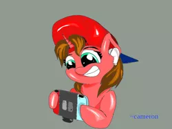 Size: 1026x768 | Tagged: safe, artist:@cameron, derpibooru import, oc, oc:nintendy, unofficial characters only, pony, unicorn, brown hair, cute, earbuds, female, fluffy hair, fluffy mane, gaming, gray background, green eyes, hat, looking at something, nintendo switch, simple background, smiling, solo