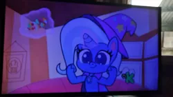 Size: 1280x720 | Tagged: safe, derpibooru import, screencap, trixie, pony, unicorn, friendship gems, my little pony: pony life, spoiler:pony life s01e12, spoiler:pony life s01e17, discovery kids logo, low quality, photo, picture of a screen