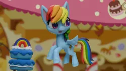 Size: 1920x1080 | Tagged: safe, derpibooru import, screencap, rainbow dash, pony, cake off, my little pony: pony life, my little pony: stop motion short, cake, food, image, png, solo, stop motion