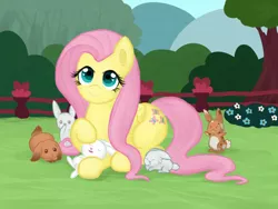 Size: 1280x960 | Tagged: safe, artist:podiponi, derpibooru import, fluttershy, pegasus, pony, rabbit, animal, bush, ear fluff, female, fence, flower, folded wings, grass, heart eyes, image, looking at you, lying down, mare, outdoors, petting, png, prone, smiling, solo, three quarter view, tree, wingding eyes, wings